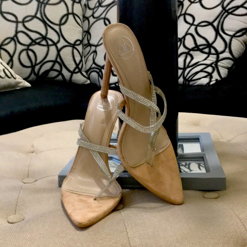 Brand new clear and neutral color heels with rhinestones detail.